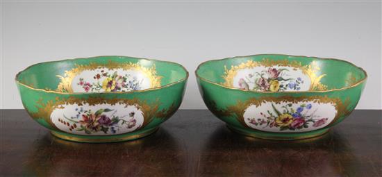 A pair of Sevres porcelain green ground bowls, c.1773, diameter incl. mounts 24cm (9.5in.), some decoration possibly later